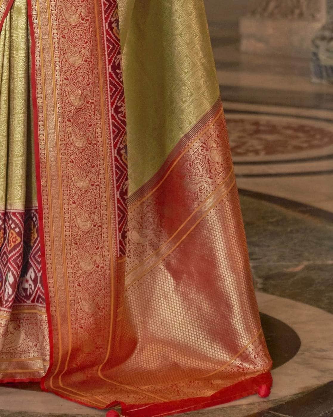 -1117Wx1400H-467001209-olive-MODEL5 Women Patola Woven Saree with Latkans Border - Image 4