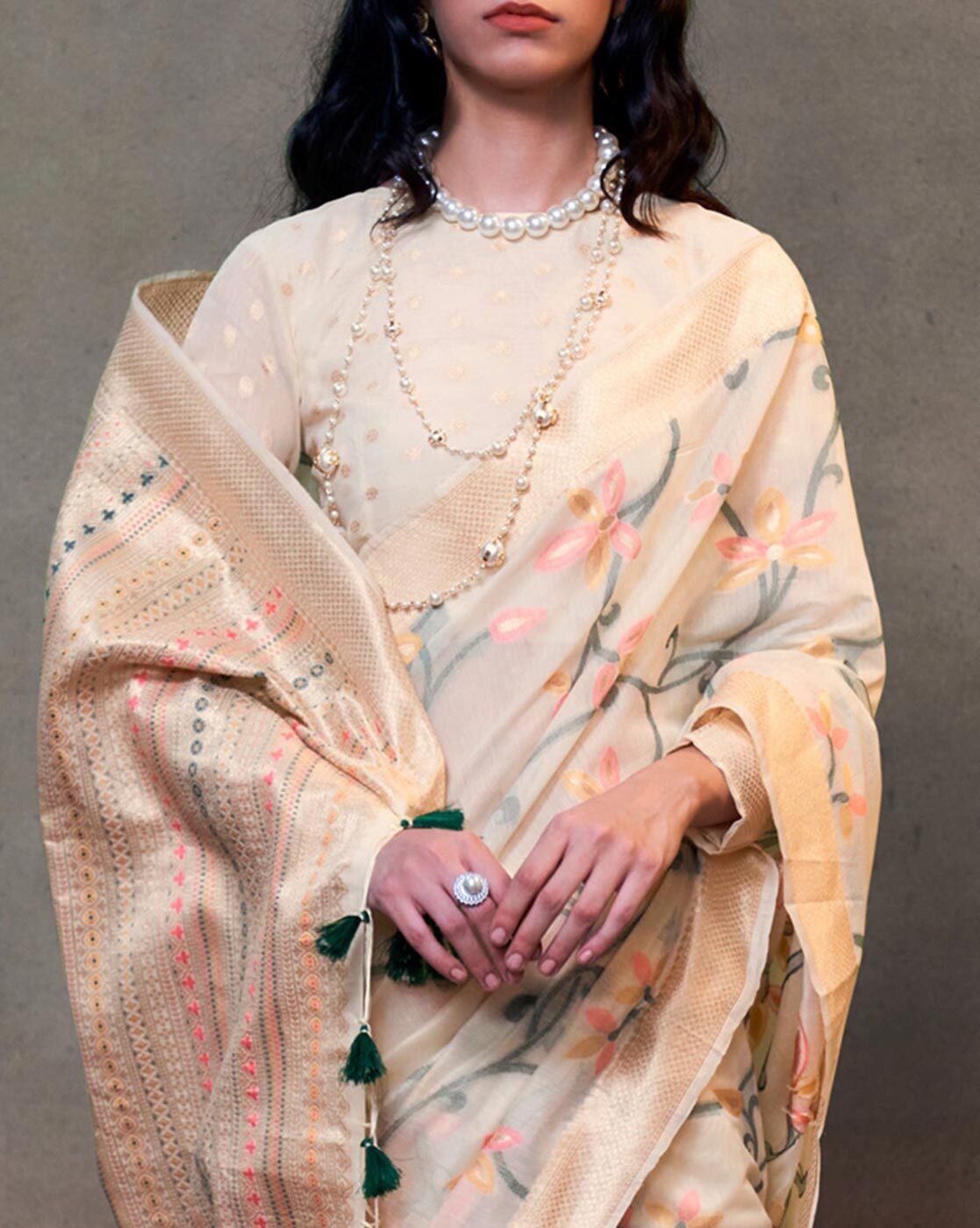 -1117Wx1400H-700186871-cream-MODEL3 Women Floral Woven Silk Saree with Tassels - Image 3